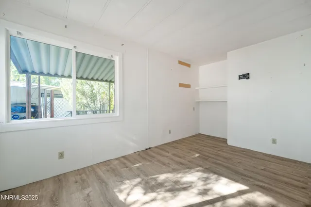 a view of small space with wooden floor
