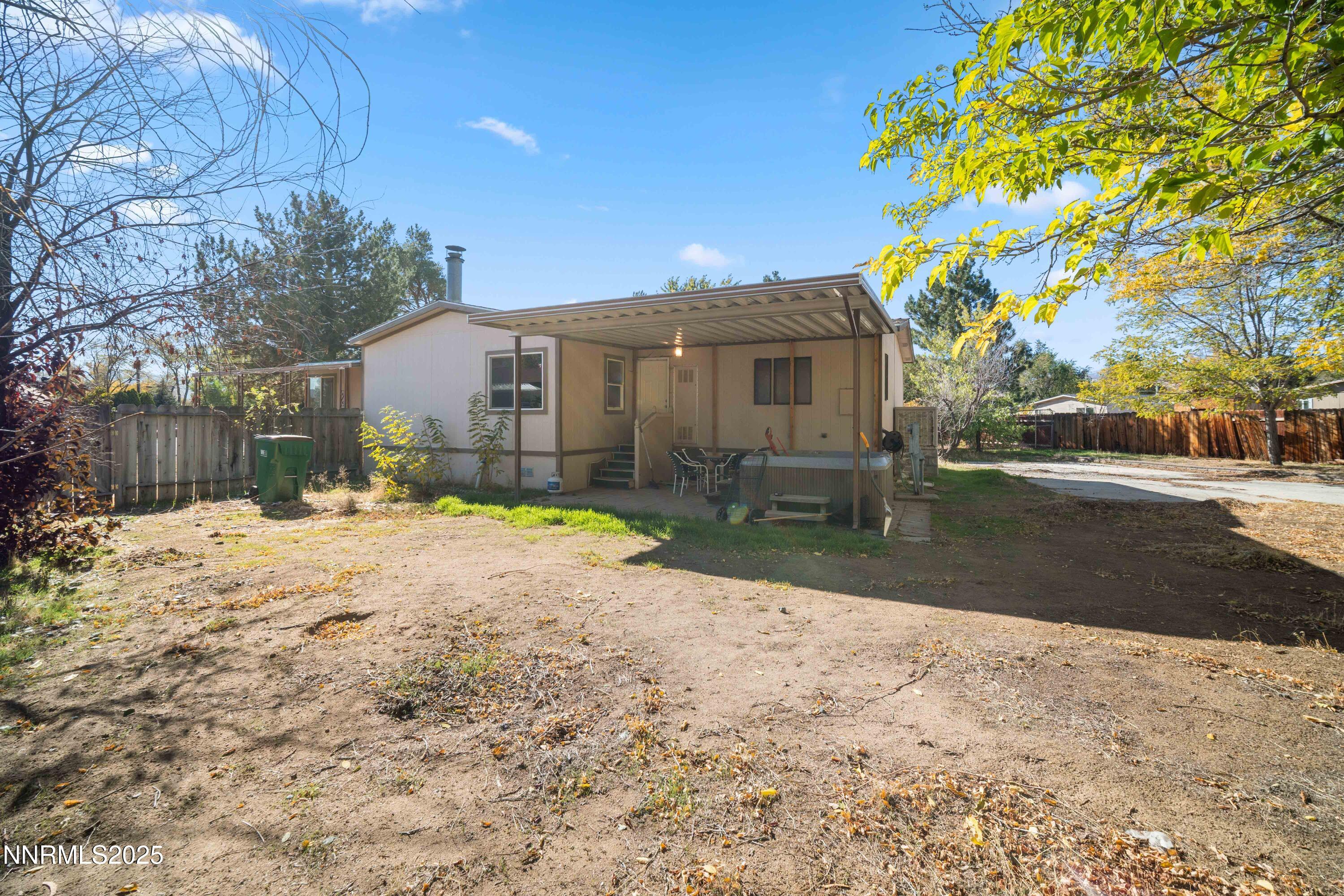 2524 Sneddon Way Carson City, NV 89706 - Photo 25 of 34 a view of a house with a yard
