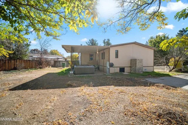 a view of a backyard of the house