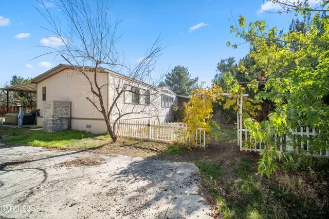a house view with a outdoor space