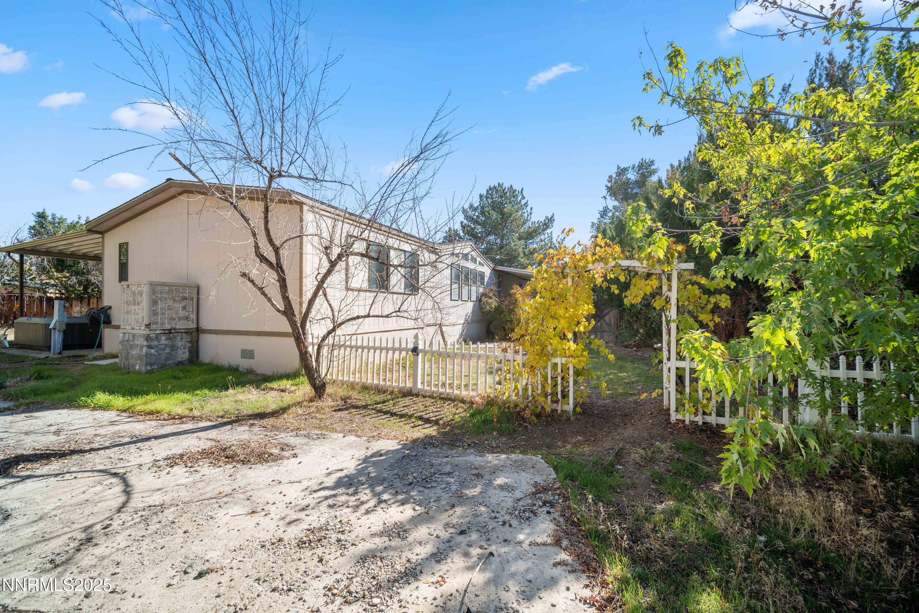 2524 Sneddon Way Carson City, NV 89706 - Photo 30 of 34 a house view with a backyard