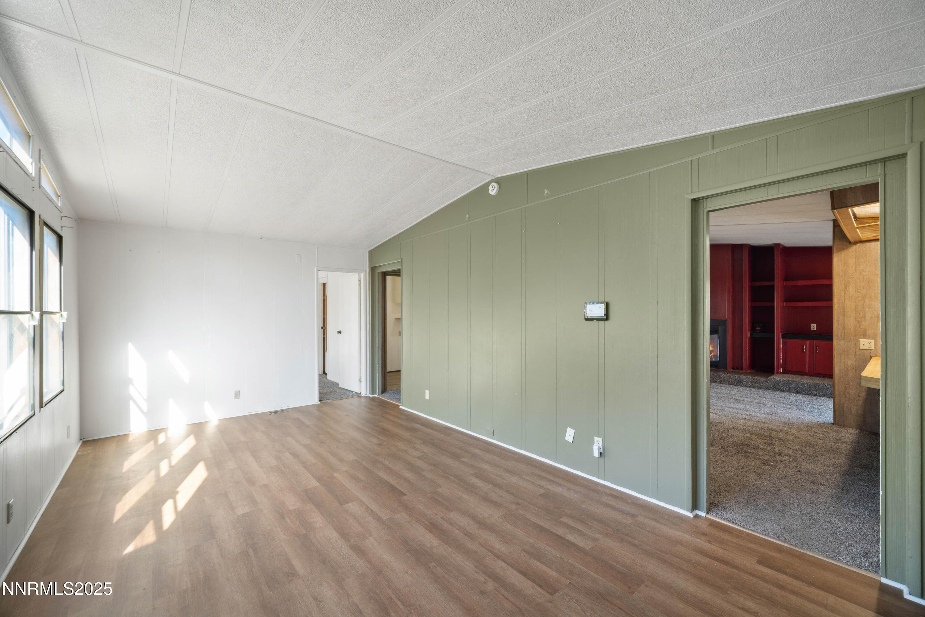 2524 Sneddon Way Carson City, NV 89706 - Photo 3 of 34 a view of a big room with windows and entryway