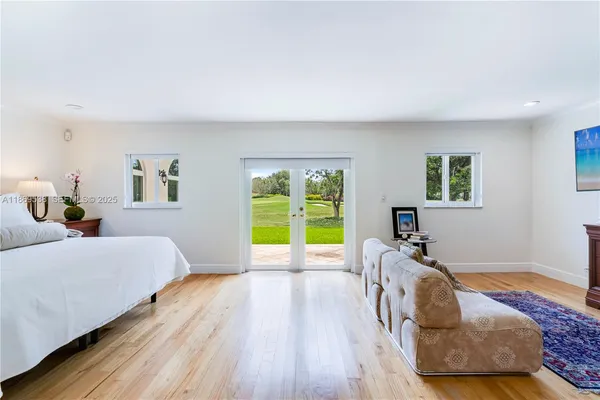 a bed room with furniture and a window