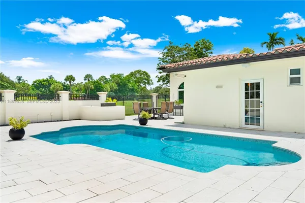 a view of a house with a big yard