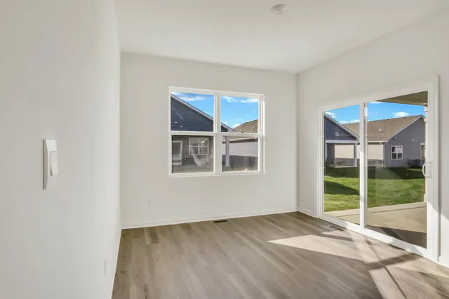 a view of an empty room and window