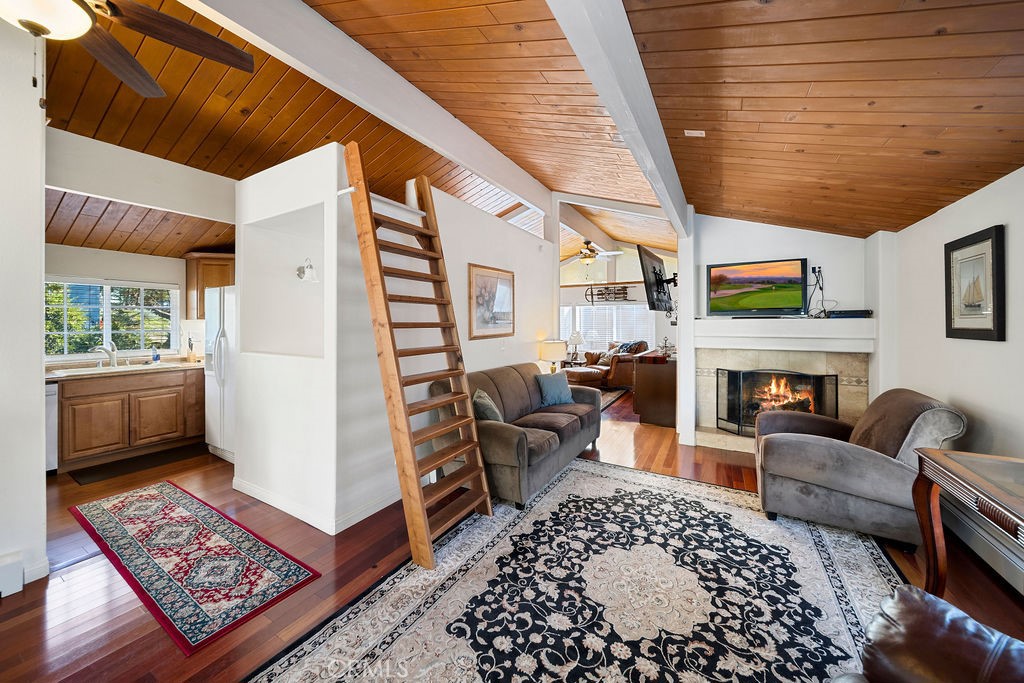 33353 Music Camp Road Running Springs, CA 92382 - Photo 11 of 30 a living room with furniture and a fireplace