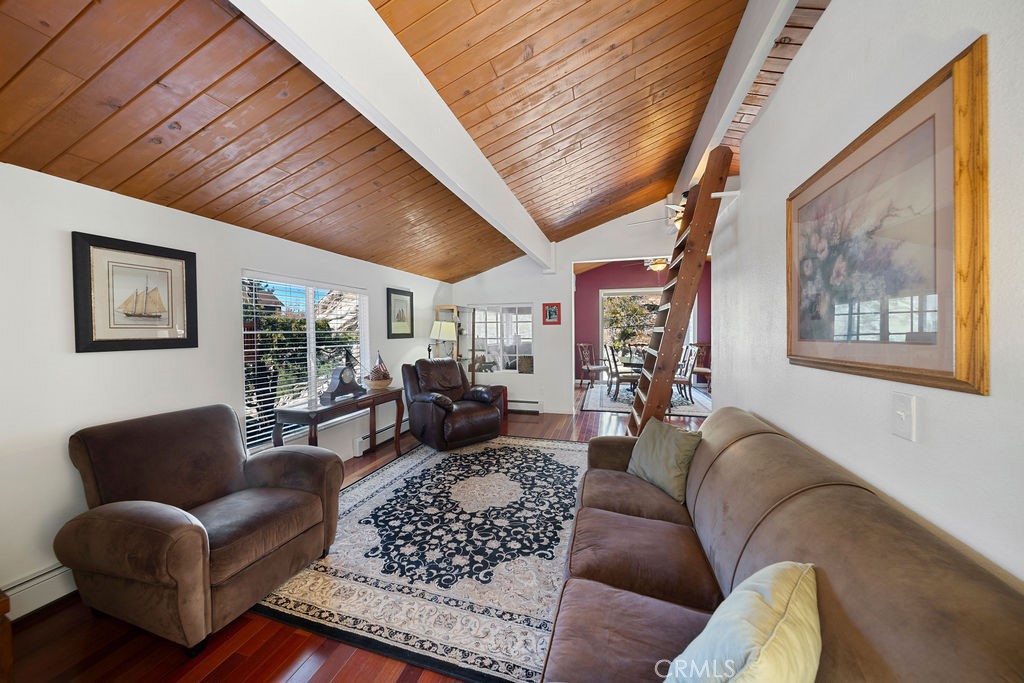 33353 Music Camp Road Running Springs, CA 92382 - Photo 12 of 30 a living room with furniture ceiling fan and a rug