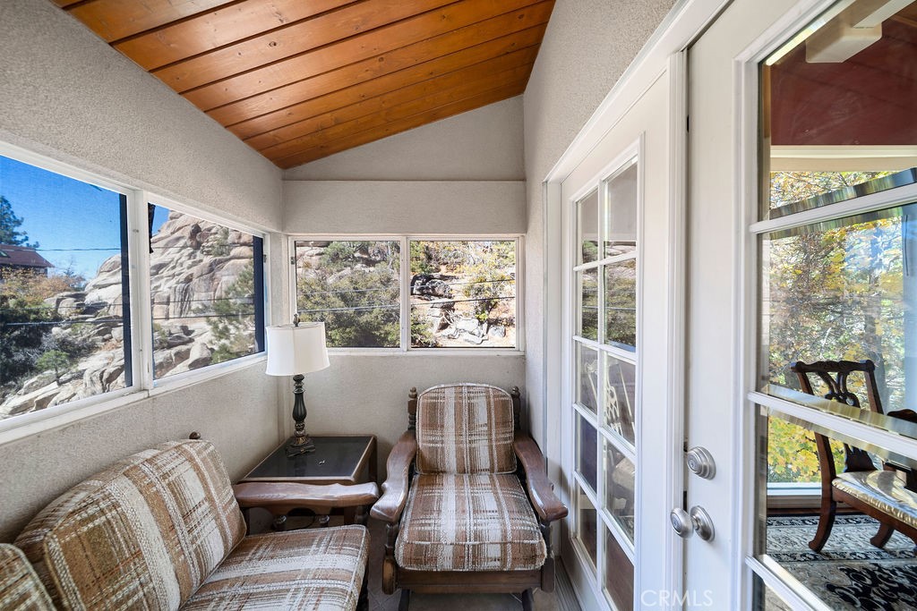 33353 Music Camp Road Running Springs, CA 92382 - Photo 15 of 30 a view of a living room with furniture and a window