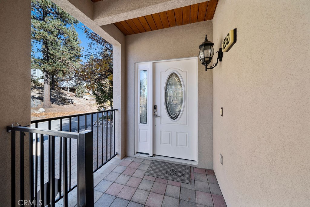 33353 Music Camp Road Running Springs, CA 92382 - Photo 30 of 30 a view of a entryway door with wooden floor