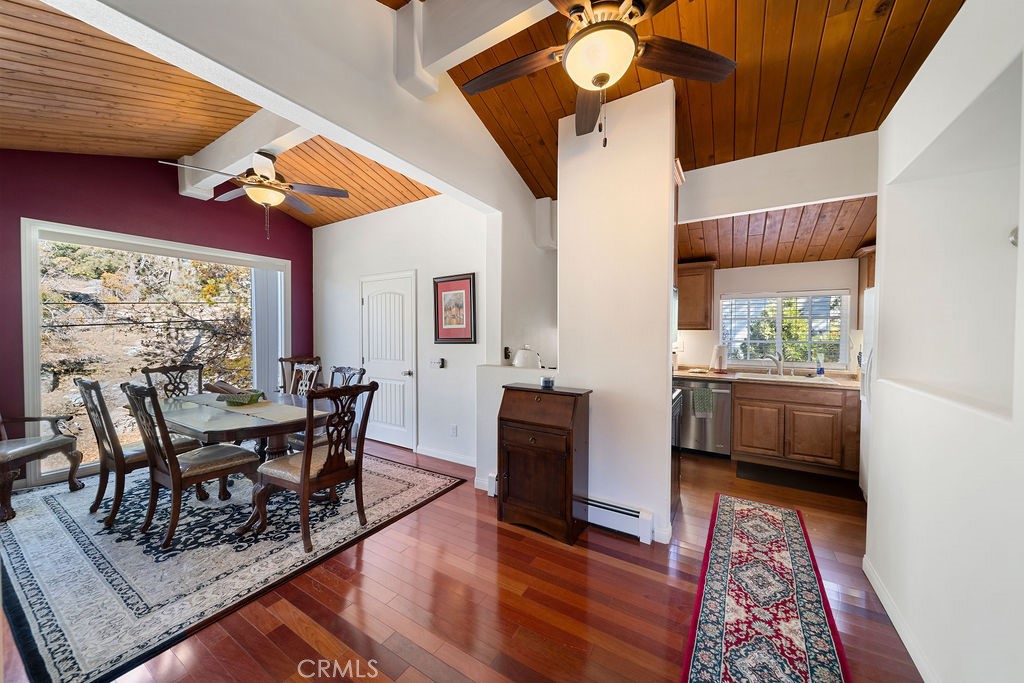 33353 Music Camp Road Running Springs, CA 92382 - Photo 7 of 30 a view of a dining room with furniture window and wooden floor