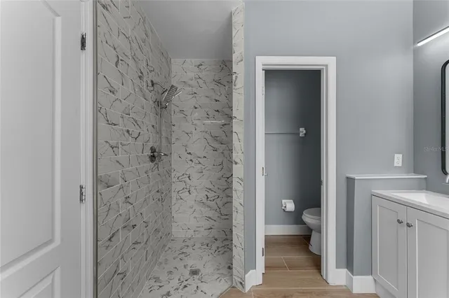 a view of entryway with wooden floor