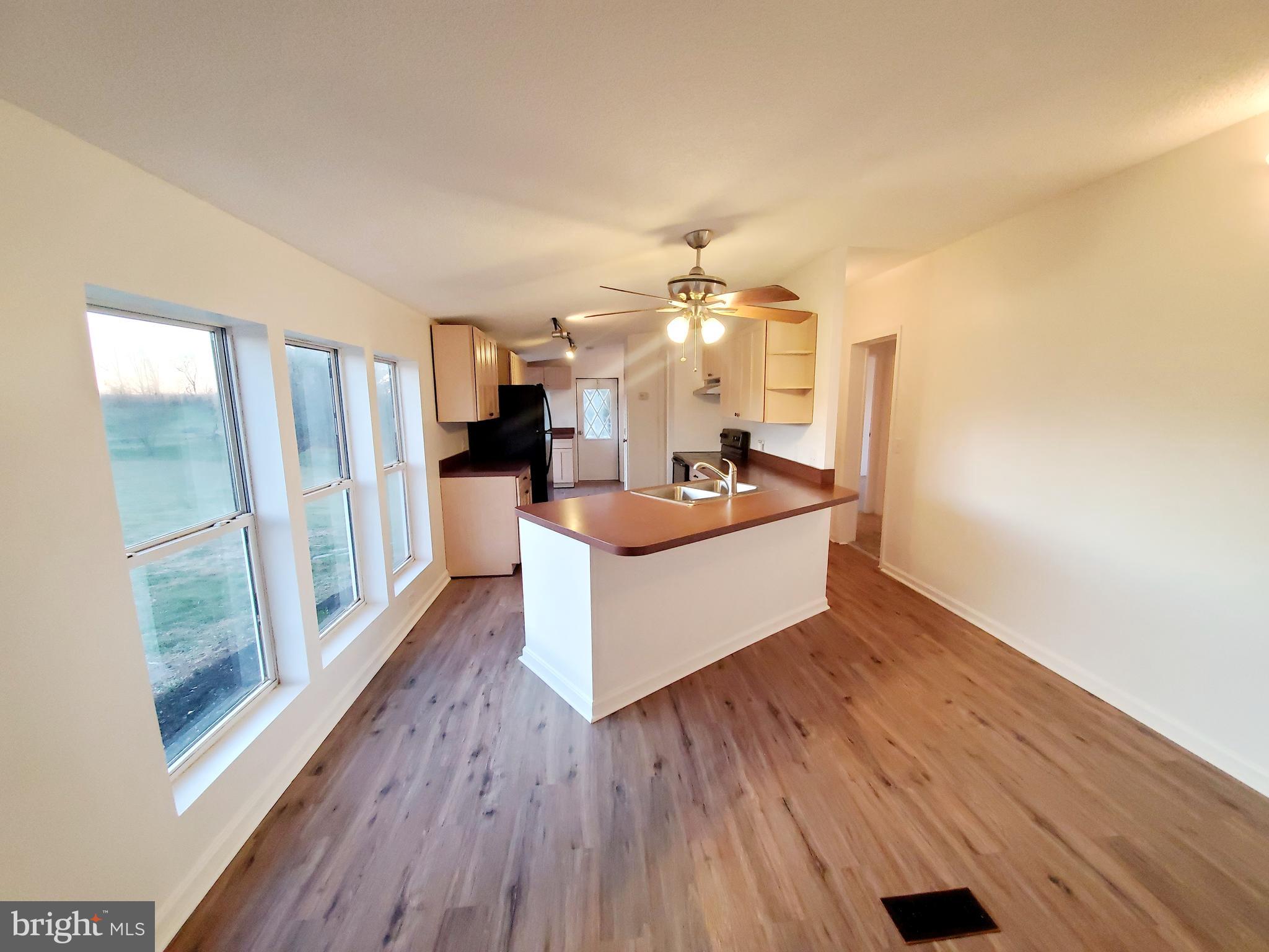 202 Muzzey Road Shepherdstown, WV 25443 - Photo 5 of 19 LVT flooring throughout the kitchen