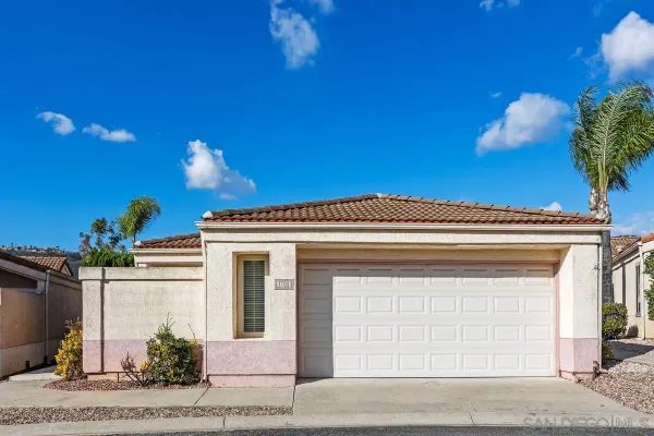 a view of a house with a garage