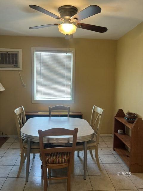 103 North Clay Street Independence, CA 93526 - Photo 7 of 25 a view of a dining room with furniture and a chandelier