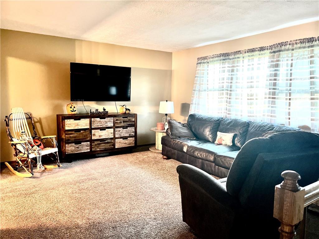 847 Patton Road New Castle, PA 16105 - Photo 6 of 25 a living room with furniture and a flat screen tv