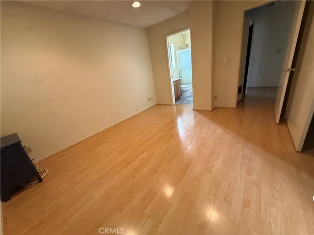 a kitchen with granite countertop cabinets stove and sink