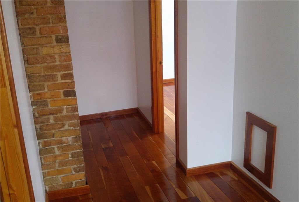 754 Purchase Line Road Clymer, PA 15728 - Photo 11 of 13 Wonderfully finished upstairs hallway with exposed brick accent