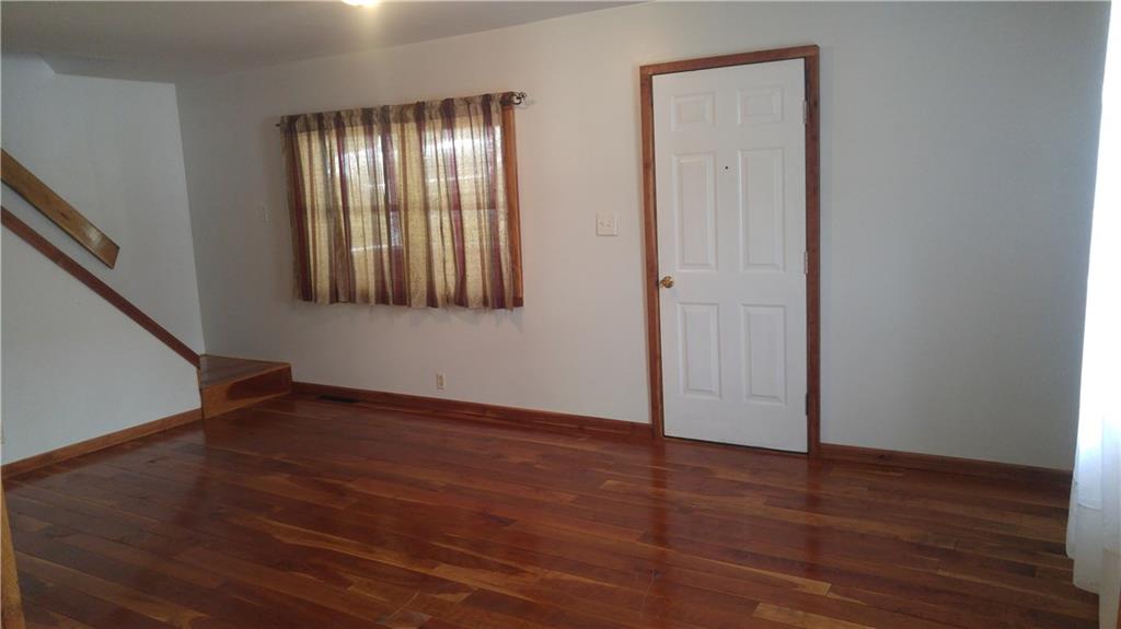 754 Purchase Line Road Clymer, PA 15728 - Photo 3 of 13 Spacious family room with magnificent brand new hardwood floors