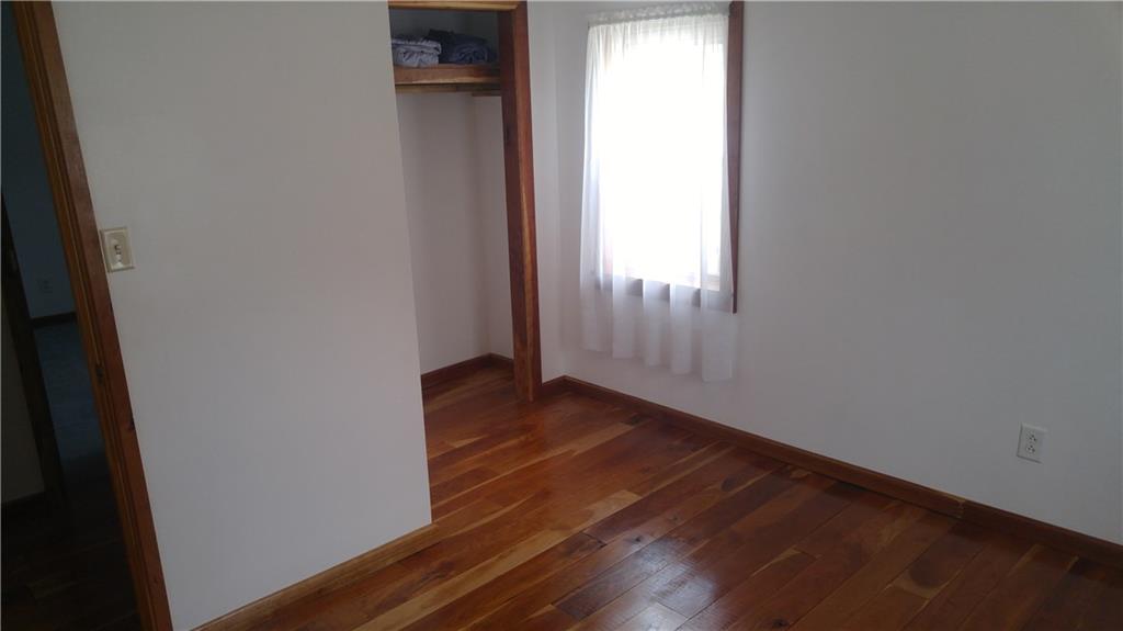 754 Purchase Line Road Clymer, PA 15728 - Photo 10 of 13 Bedroom 2 with closet space and hardwood floors