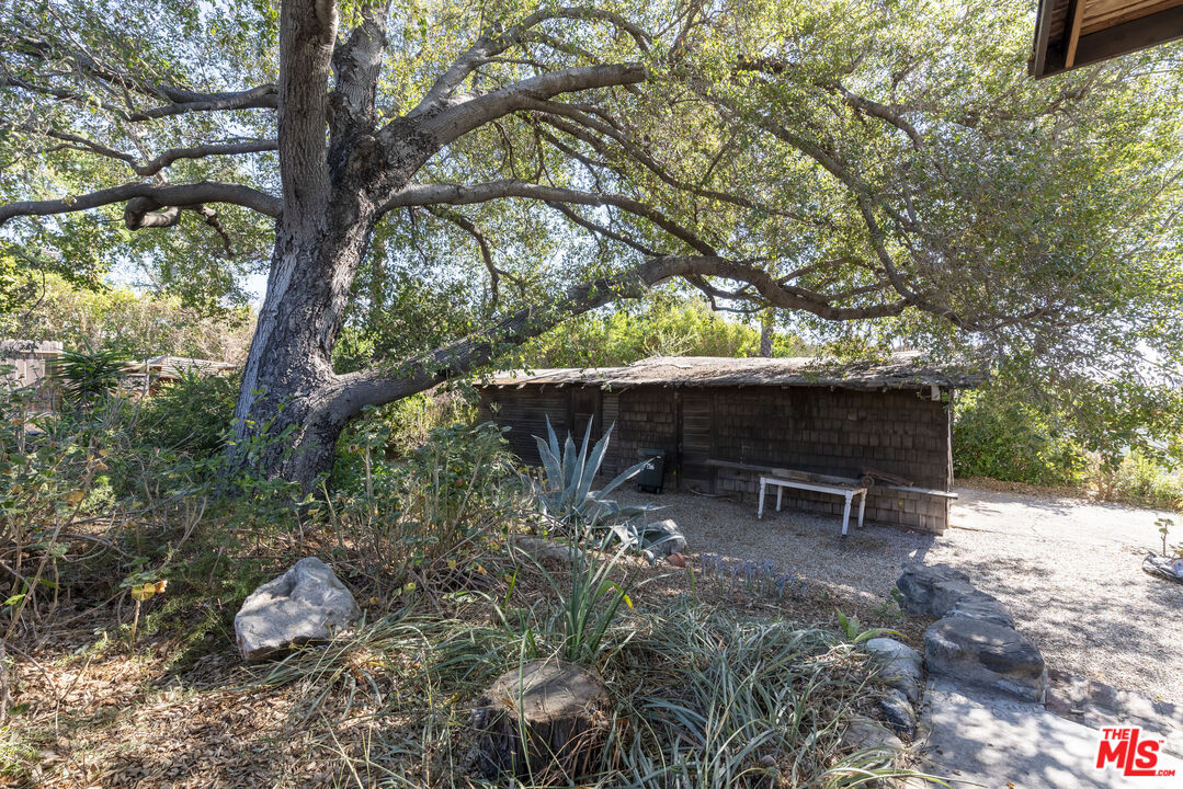 1432 Valley View Road Glendale, CA 91202 - Photo 13 of 17 a backyard of a house with table and chairs