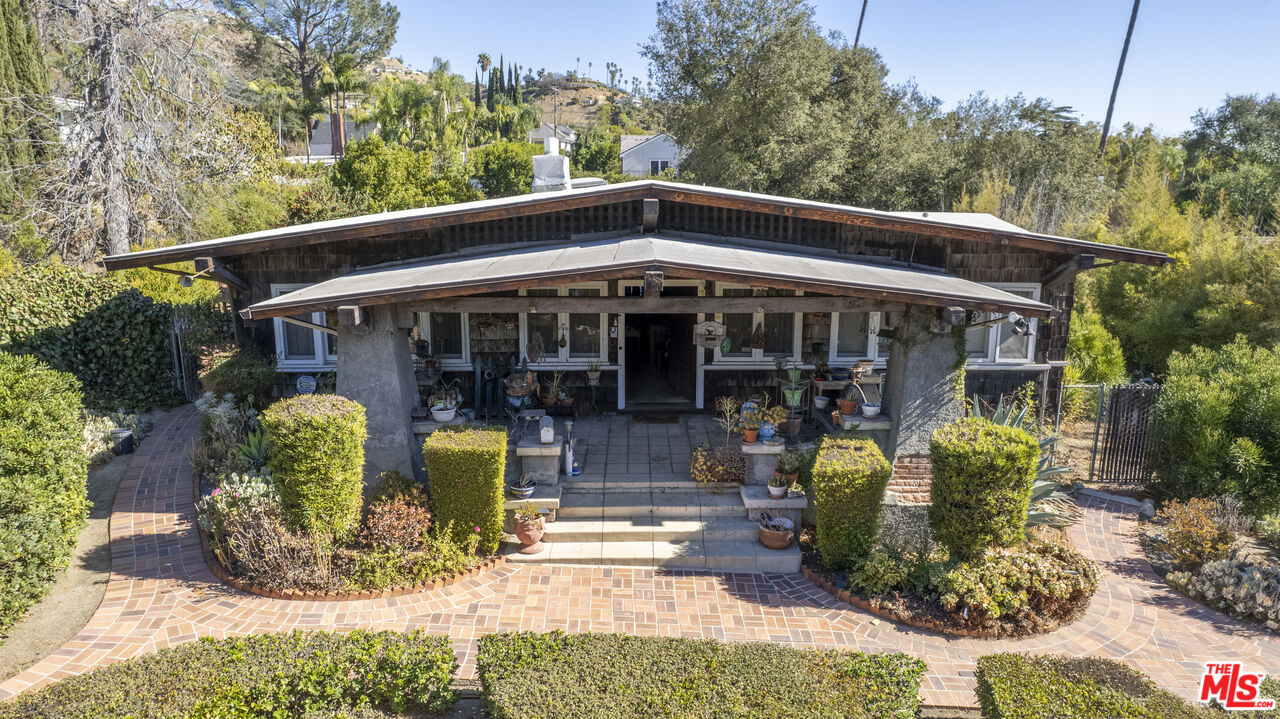 1432 Valley View Road Glendale, CA 91202 - Photo 2 of 17 a view of a chair and table in patio of the house