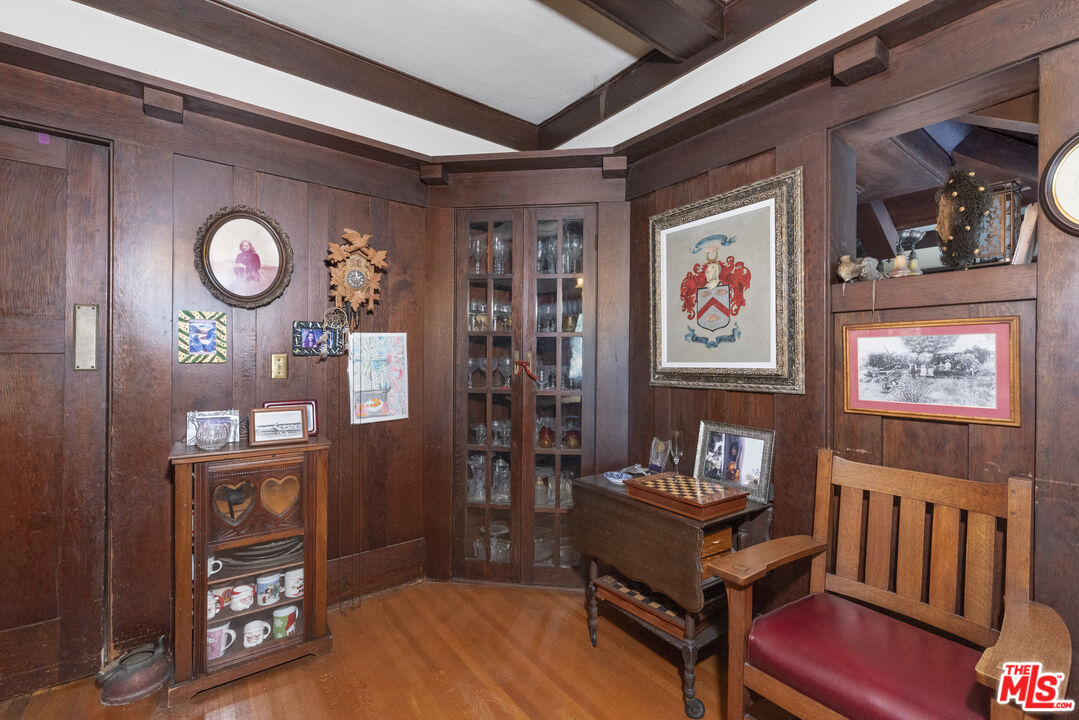 1432 Valley View Road Glendale, CA 91202 - Photo 7 of 17 a view of a hallway with wooden floor and furniture