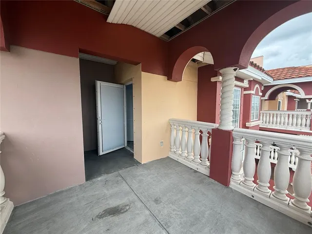 a view of an entryway with a house