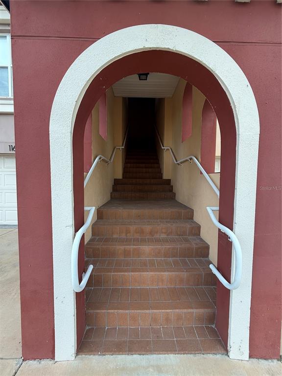 116 131st Avenue East, Unit C Madeira Beach, FL 33708 - Photo 38 of 41 a view of entryway with wooden floor