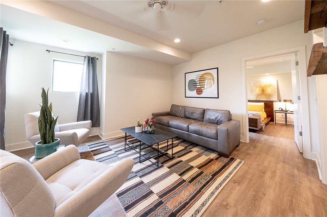 1603 Enfield Road, Unit 306 Austin, TX 78703 - Photo 3 of 16 Large, Open Living Area with updated Plank Flooring (added throughout)
