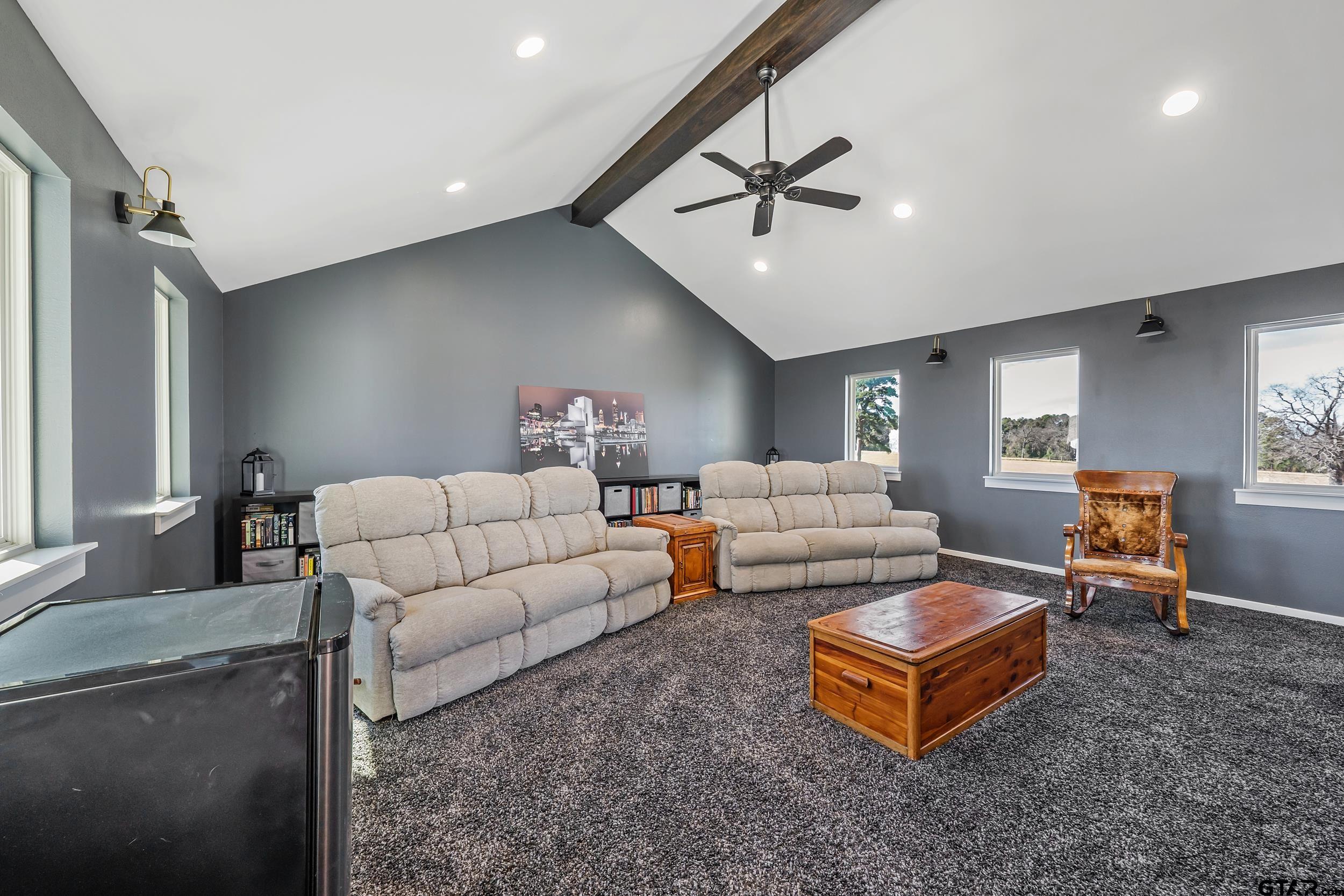 223 Riata Road Bullard, TX 75757 - Photo 22 of 45 a living room with furniture and a rug