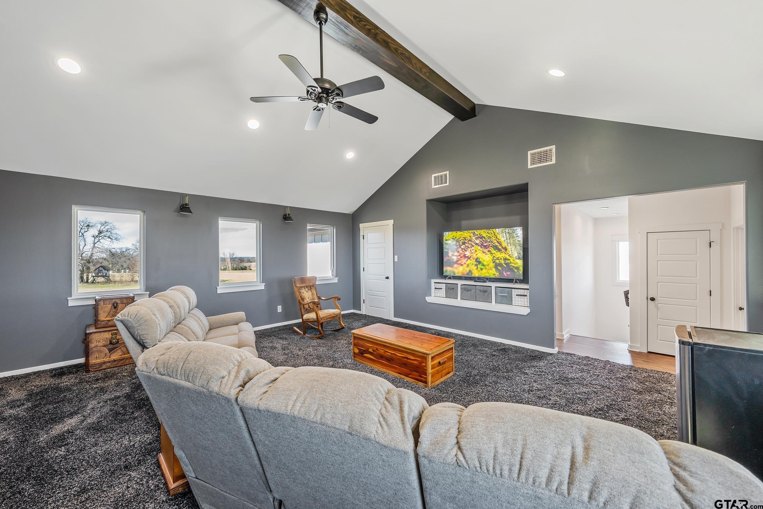 223 Riata Road Bullard, TX 75757 - Photo 23 of 45 a living room with furniture and windows