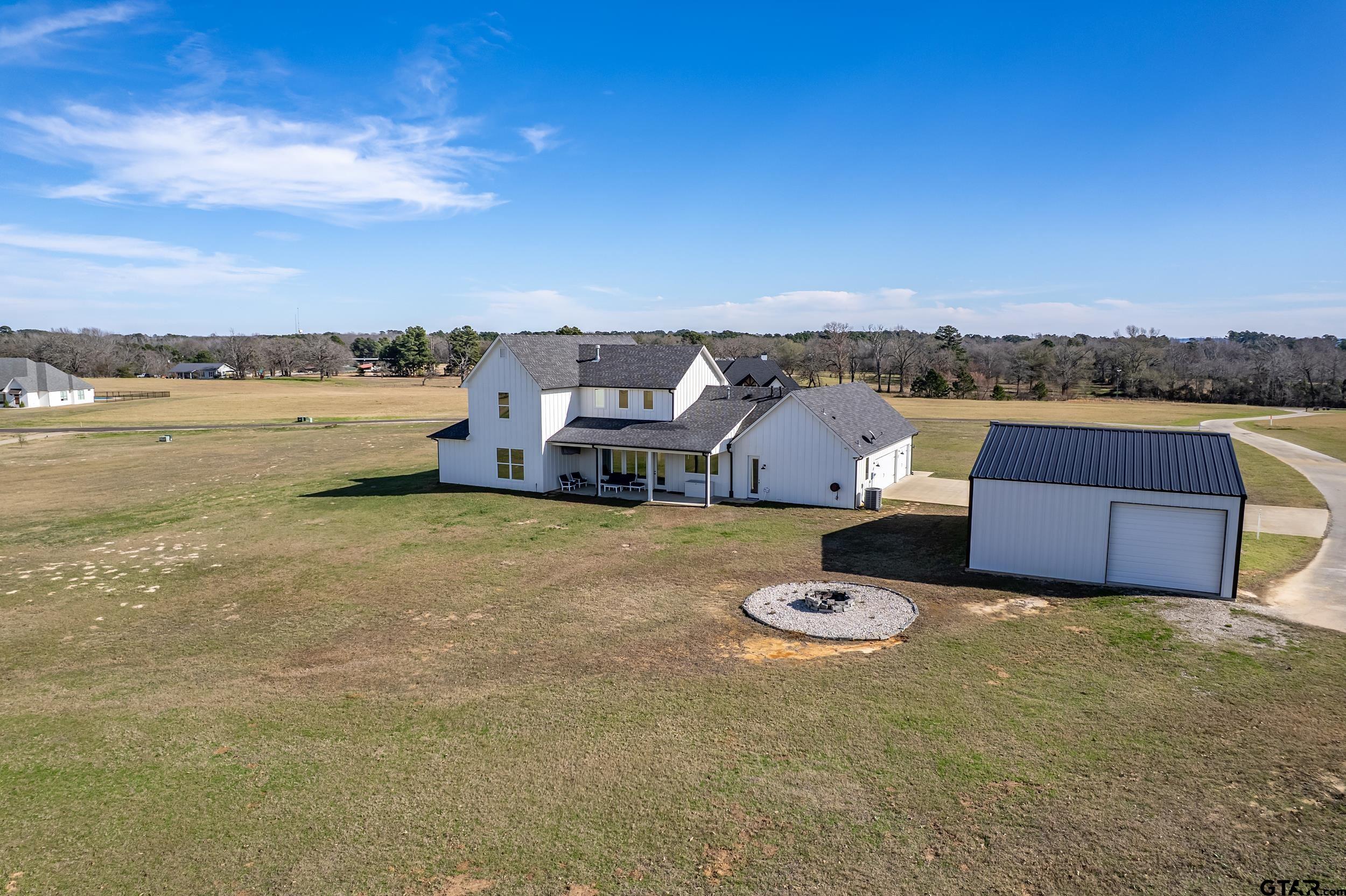 223 Riata Road Bullard, TX 75757 - Photo 40 of 45 a view of a lake with a houses