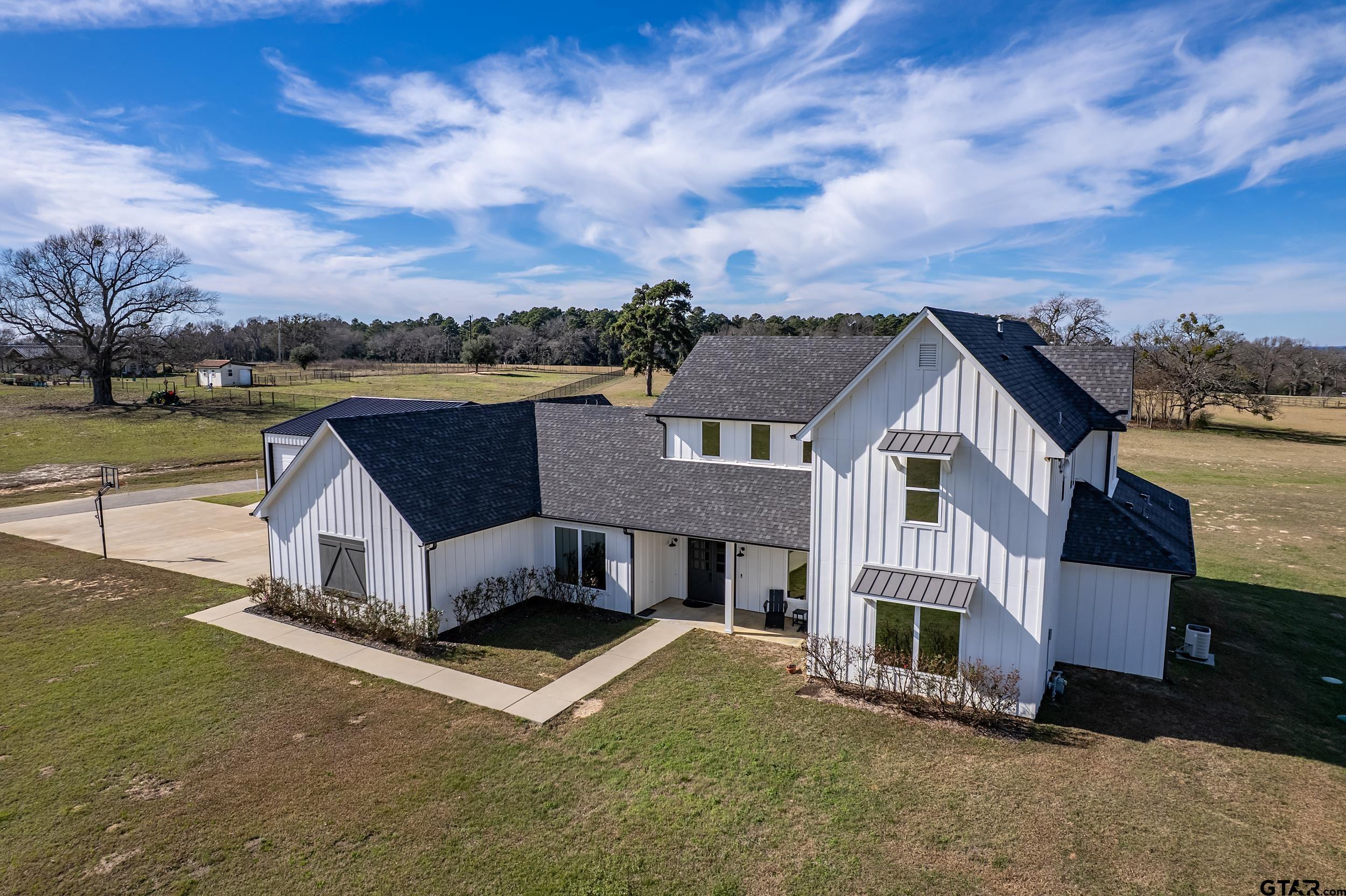 223 Riata Road Bullard, TX 75757 - Photo 41 of 45 an aerial view of a house with a yard