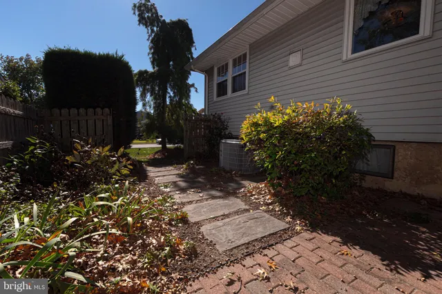 a house view with a backyard space