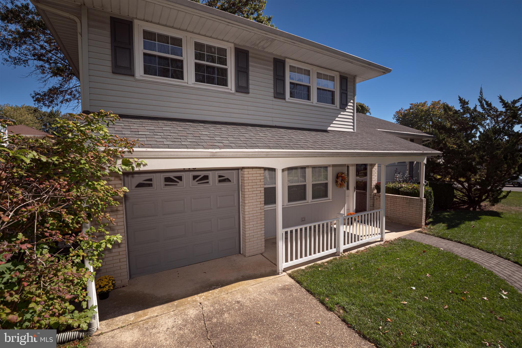 116 Autumn Horseshoe Bend Newark, DE 19702 - Photo 4 of 43 a front view of a house with a yard