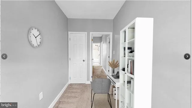 a view of a livingroom with wooden floor