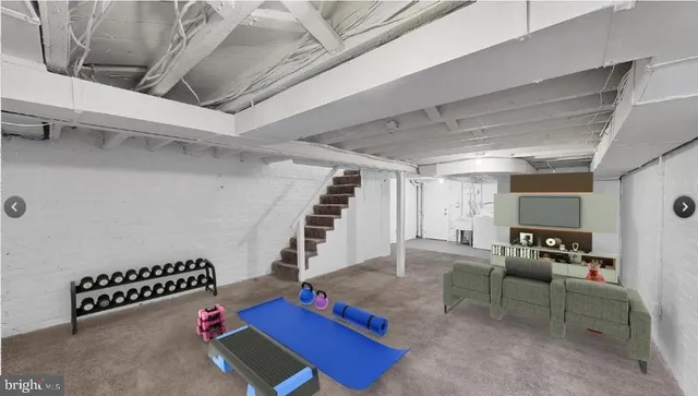 a room with furniture and air hockey table