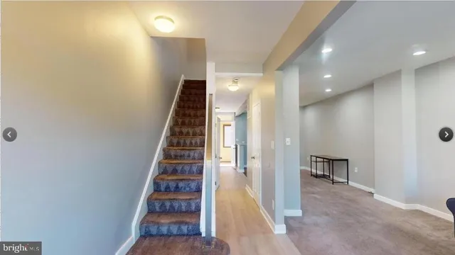 a kitchen with a stove and a refrigerator