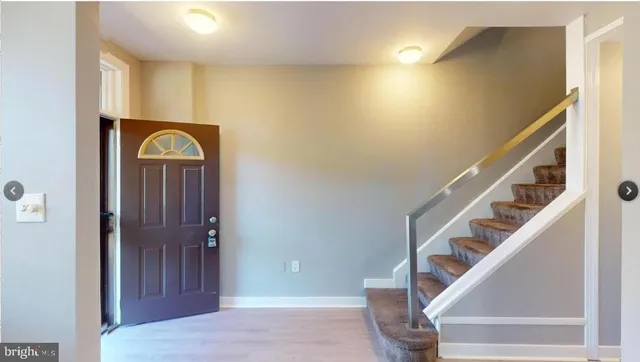 a kitchen with a stove and a microwave