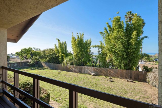 a view of a backyard and from a window