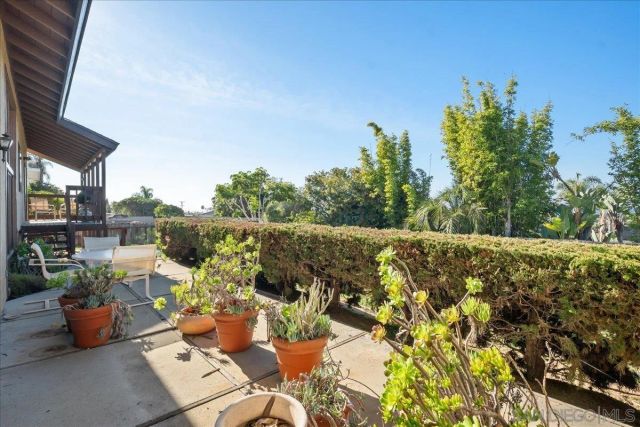 a swimming pool with wooden fence