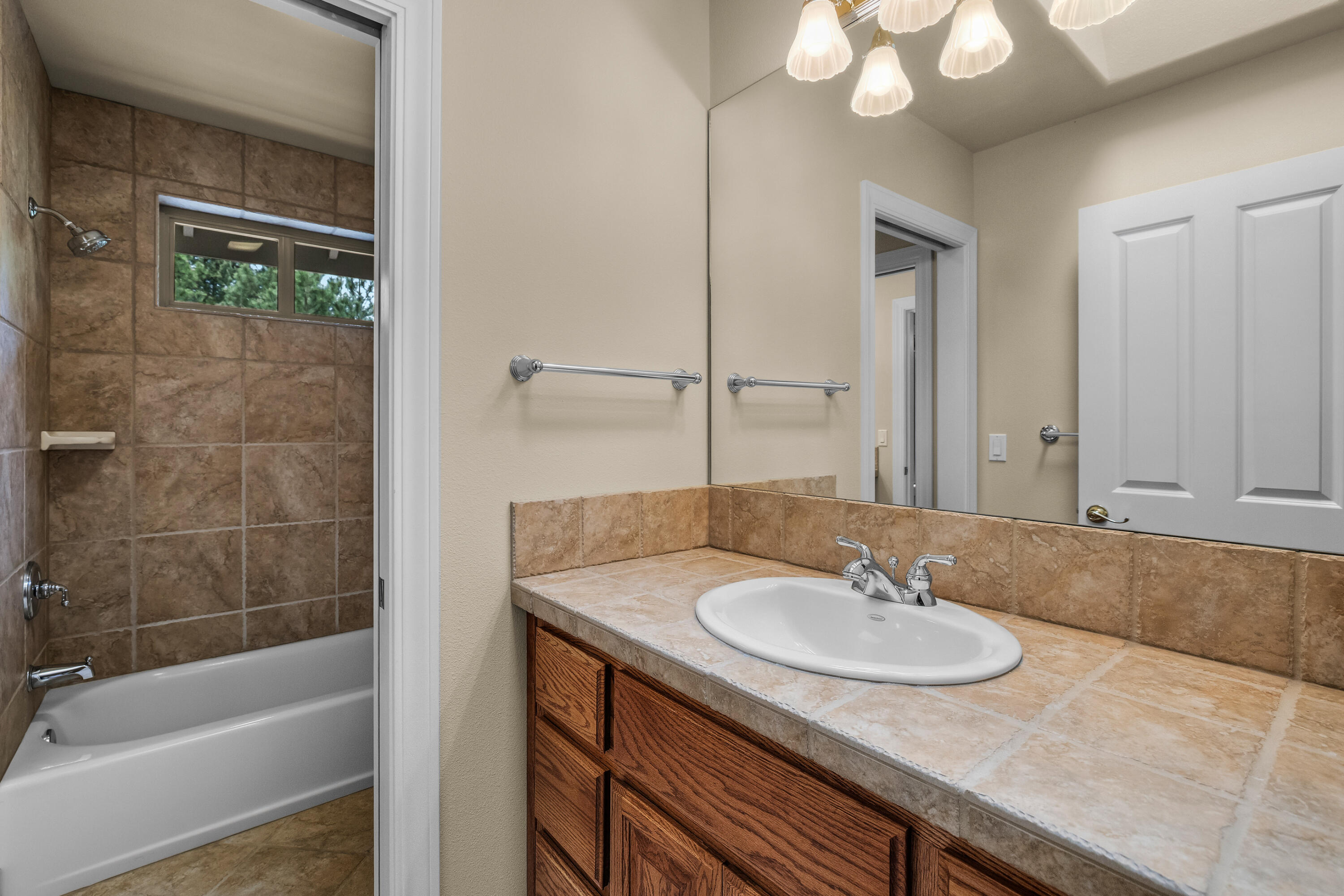 19598 Green Lakes Loop Bend, OR 97702 - Photo 42 of 89 a bathroom with a sink and a mirror