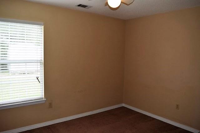 123 Oak Terrace Drive Crestview, FL 32539 - Photo 15 of 21 an empty room with a window