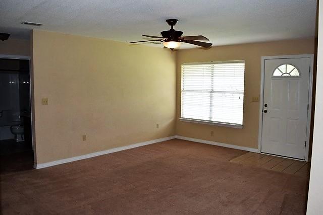 123 Oak Terrace Drive Crestview, FL 32539 - Photo 3 of 21 a view of empty room with window