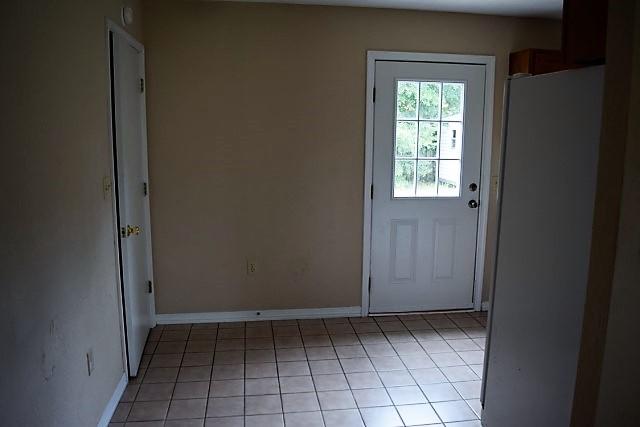 123 Oak Terrace Drive Crestview, FL 32539 - Photo 5 of 21 a view of an empty room with window