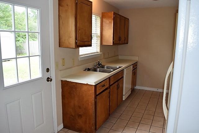 123 Oak Terrace Drive Crestview, FL 32539 - Photo 7 of 21 a utility room with kitchen island a sink a vanity and window