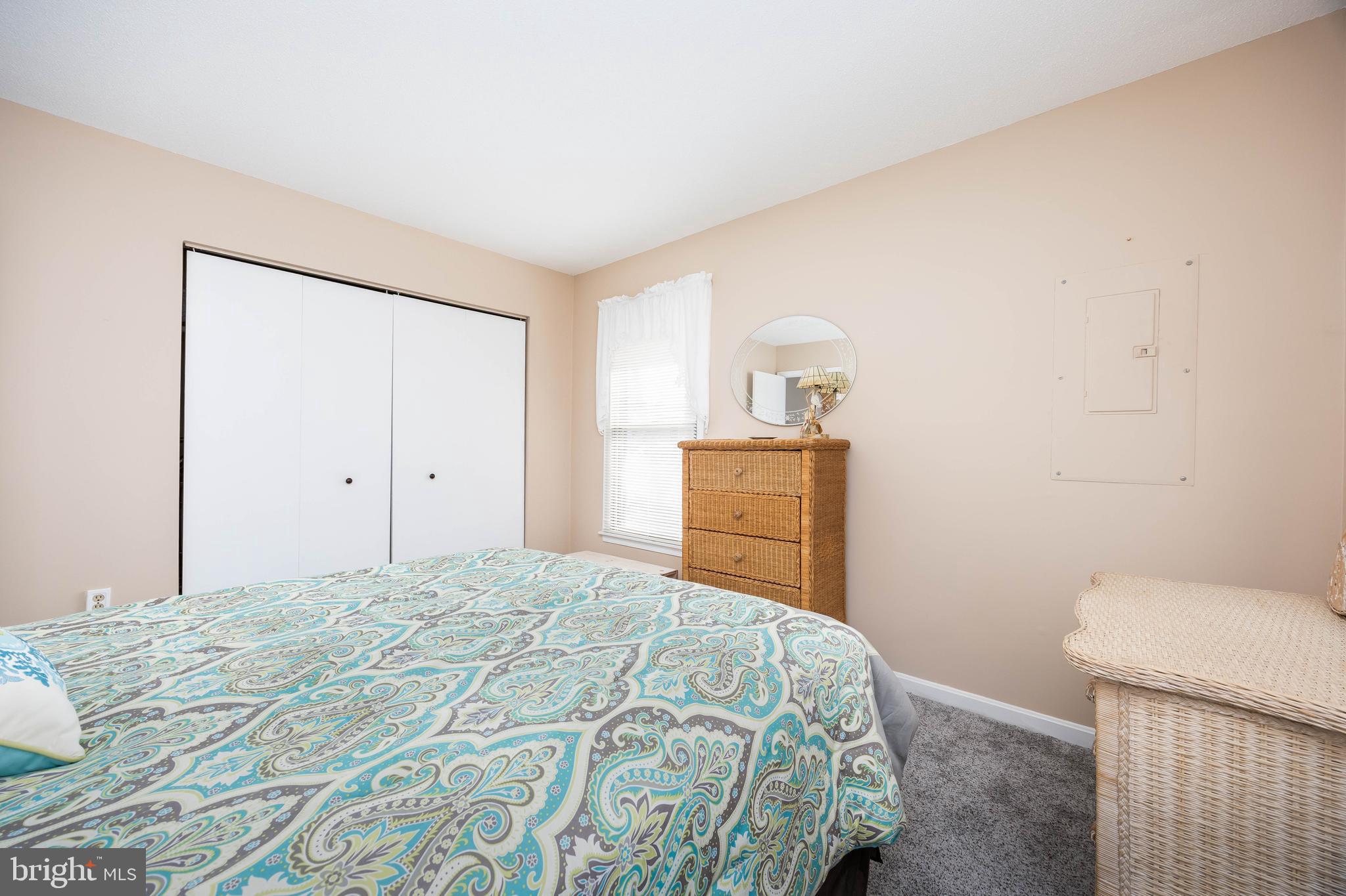 54 Falcon Bridge Road Ocean Pines, MD 21811 - Photo 20 of 53 a bedroom with a bed and a toilet