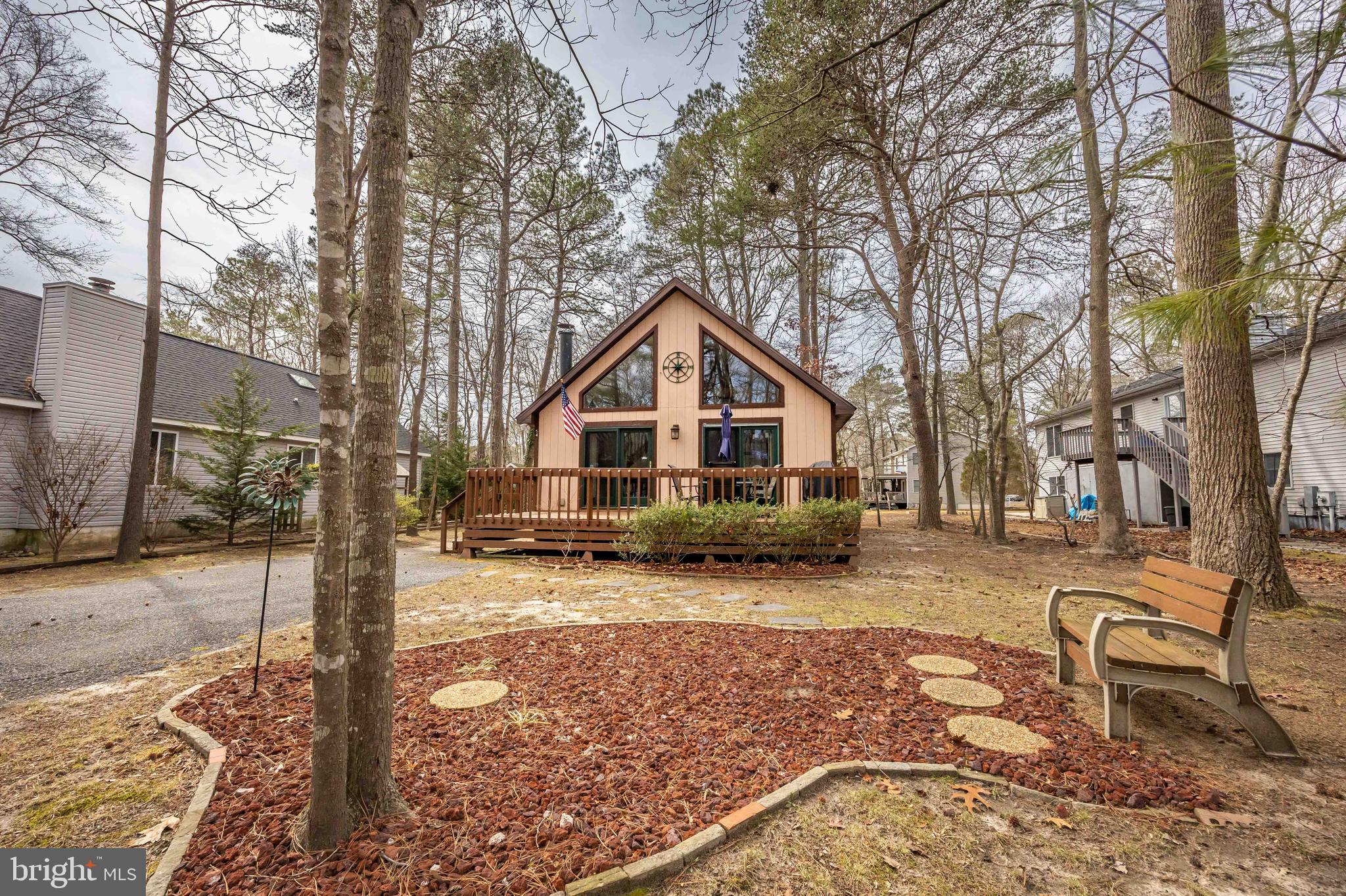 54 Falcon Bridge Road Ocean Pines, MD 21811 - Photo 51 of 53 a view of front of house with a yard