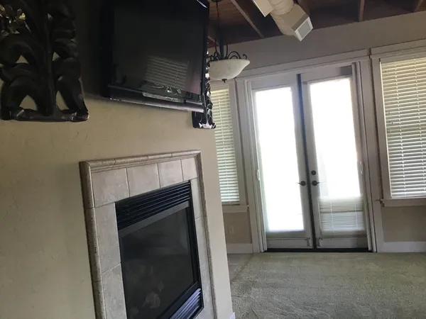 a view of a livingroom with a fireplace
