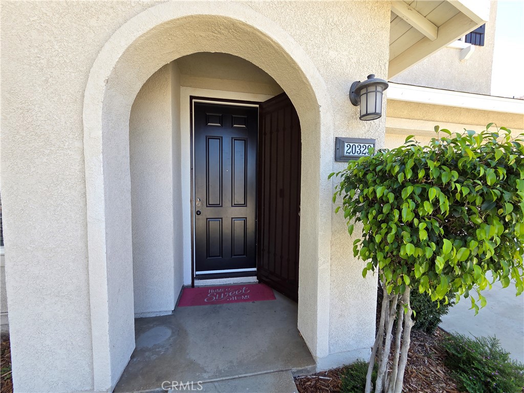 20329 Red Poppy Lane Riverside, CA 92508 - Photo 3 of 24 a view of front door of a house